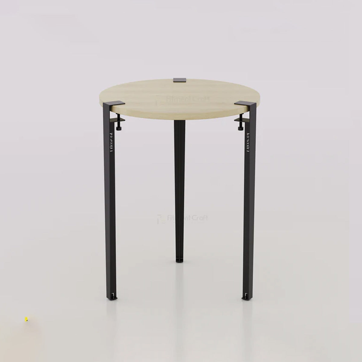 Orba round table with pale wood-tone top and black legs, front view