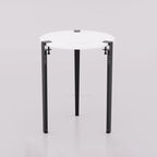 Orba round table with white top and black legs, front view