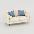 Cream Orchid two-seat sofa with blue cushions and matching cylindrical bolster cushions
