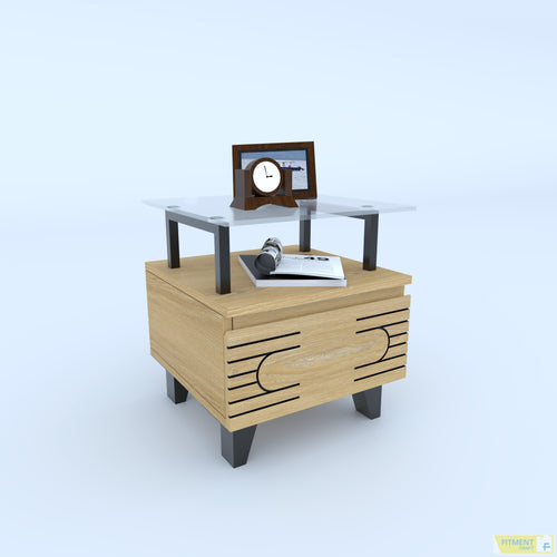 Angled view of Inscribe side table with raised glass shelf, patterned front panel and dark legs
