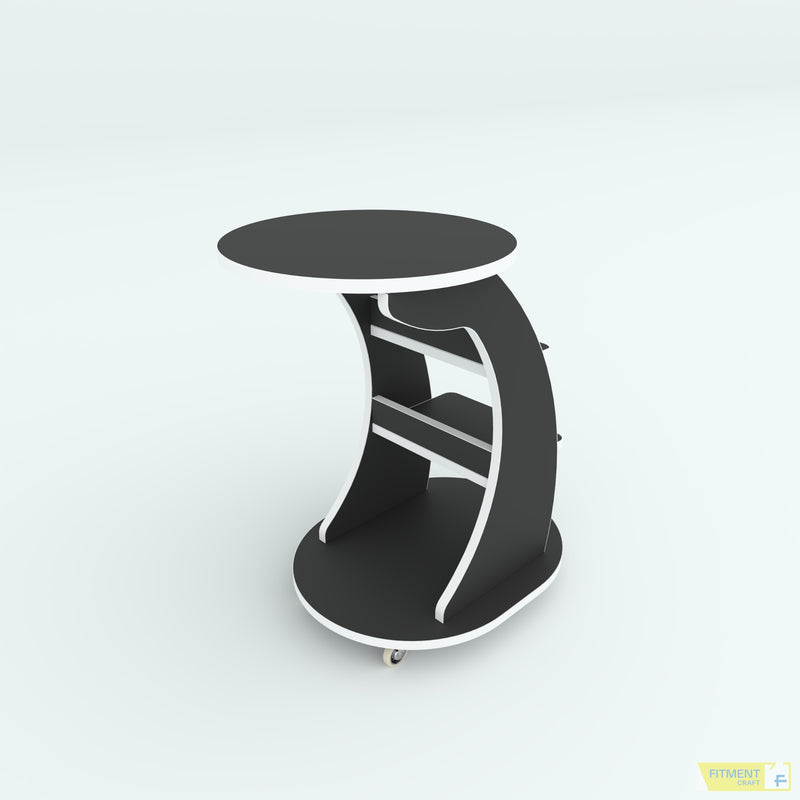 Wagon center table in black with white edging, curved side panels and caster wheels, rear angled view