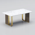 Royalia dining table with white veined top, dark panel supports and gold-tone frame