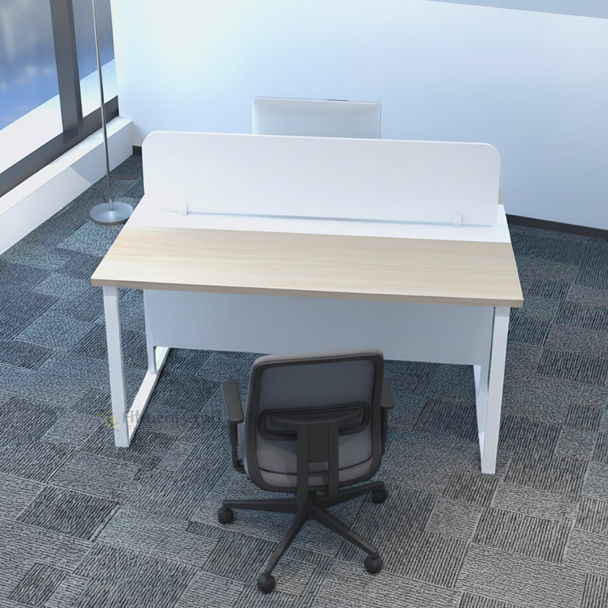 Stera workstation with pale wood-tone top, white divider and black chair in an office
