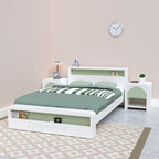 White and green Surf bed with matching bedside tables in a bedroom