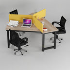 Triumph three-person workstation with yellow dividers, laptops and black chairs