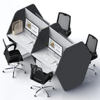 Overhead view of Unify workstation with dark tall dividers, four desks and black chairs