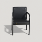 Black Vizio visitor chair with padded seat and back, front view