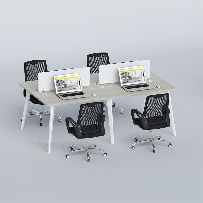 Zenora four-person workstation with laptops, white dividers and black mesh chairs