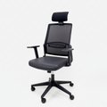 Black mesh-back Zuko office chair with headrest, armrests and caster wheels